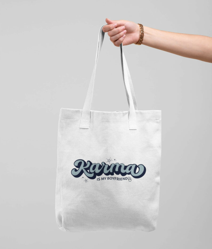 White mockup of the Karma is My Boyfriend Tote Bag inspired by Taylor Swift's new album