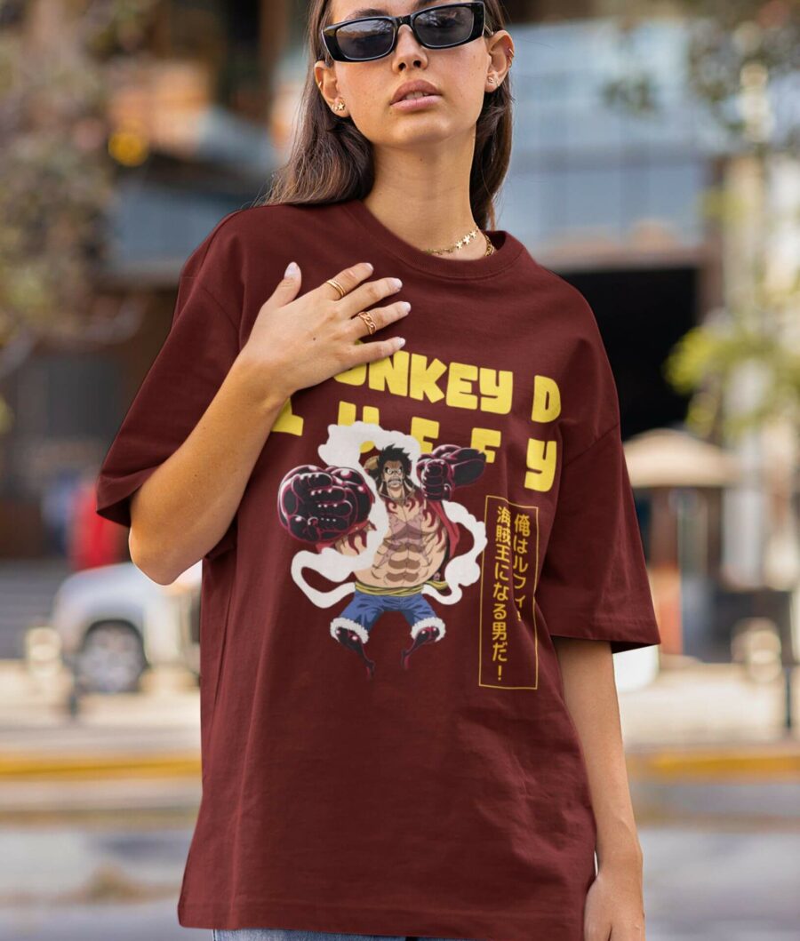 Girl wearing Monkey D Luffy One Piece Oversized T-Shirt in maroon color