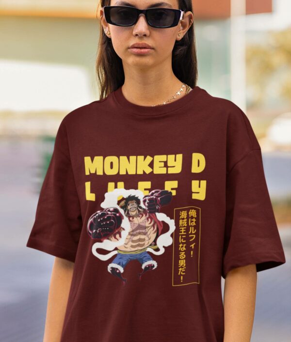Girl posing in Monkey D Luffy One Piece Oversized T-Shirt in maroon color